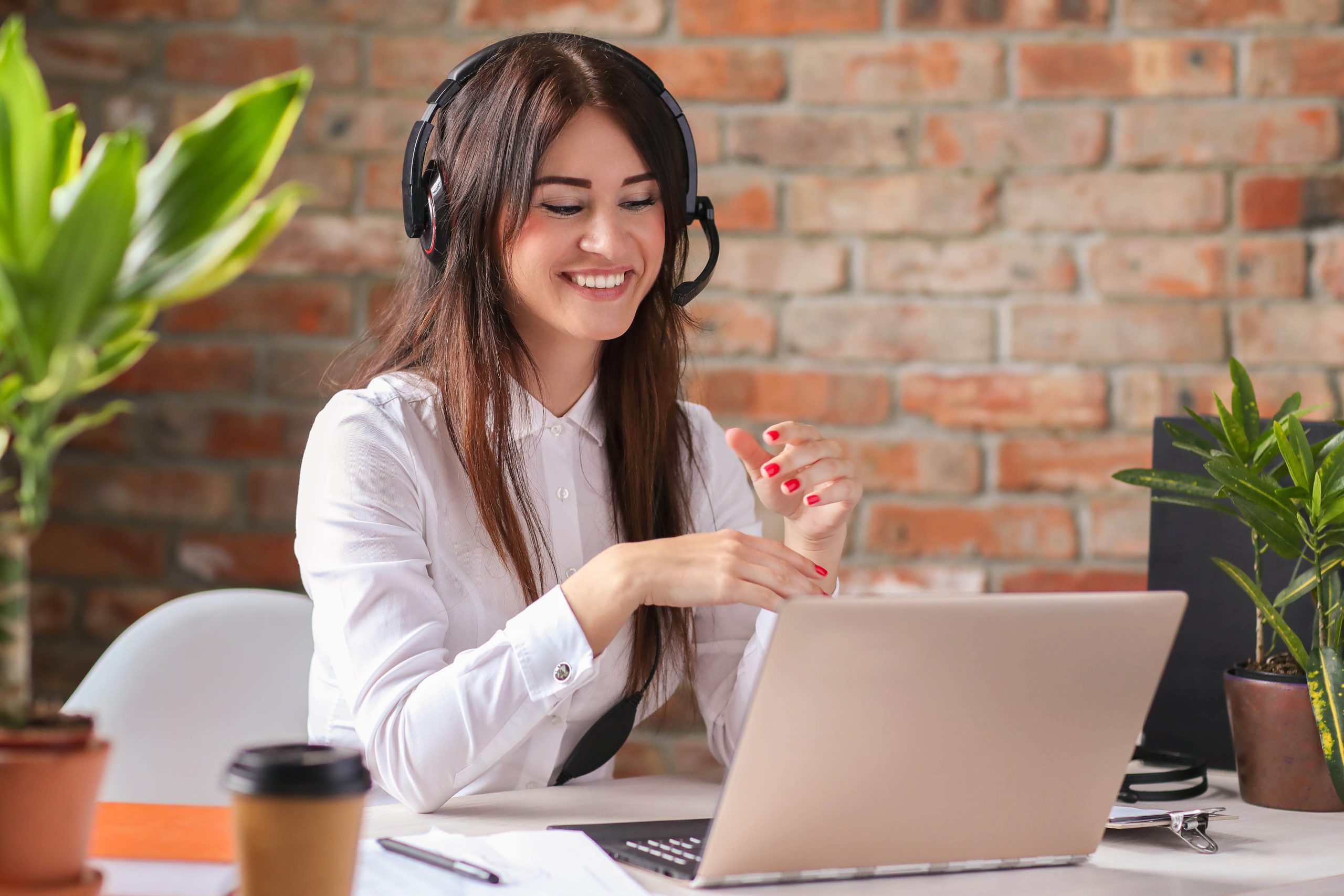 Woman working in call center as dispatcher